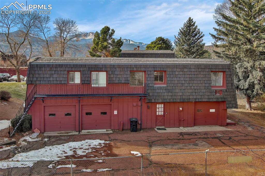 2959 Mesa Road, Unit C Colorado Springs, CO 80904 - Photo 16 of 17 a front view of a house with a yard