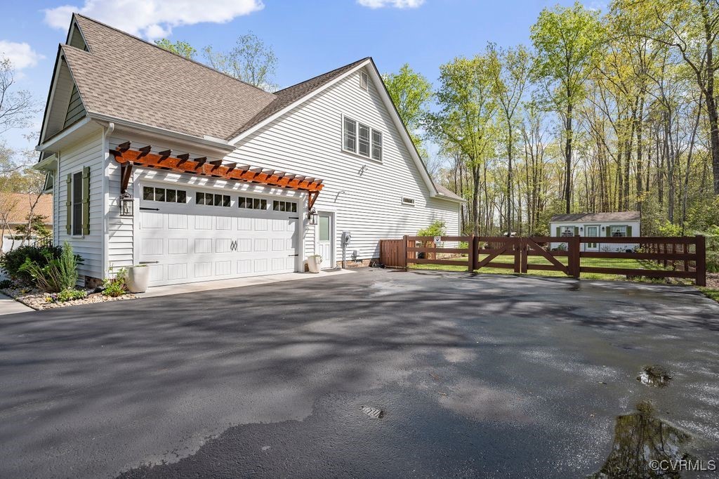 6213 Round Rock Road Chesterfield, VA 23838 - Photo 30 of 45 Oversized 2 car garage with passenger door