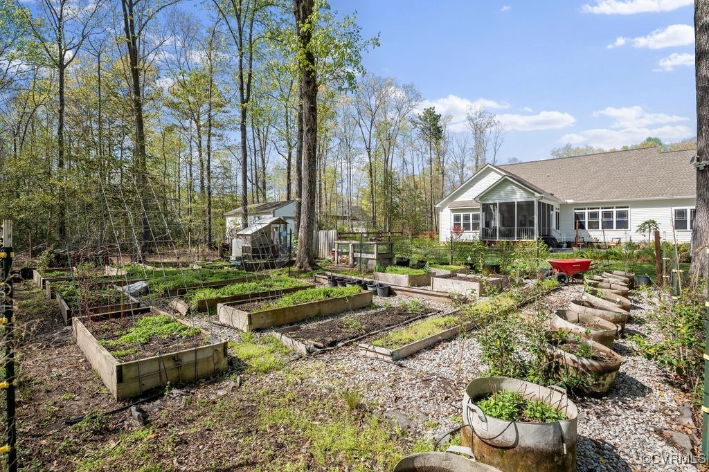6213 Round Rock Road Chesterfield, VA 23838 - Photo 41 of 45 View of yard with a garden, an outdoor structure,