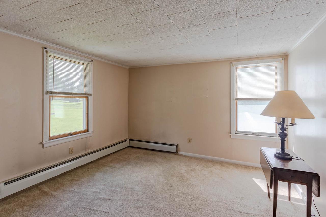 203 Gorton Road Moshannon, PA 16859 - Photo 27 of 39 a room that has a window and a table in it