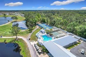 446 Pine Loop Frostproof, FL 33843 - Photo 26 of 26 an aerial view of a house with a yard basket ball court and outdoor seating