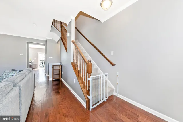 a spacious bedroom with a bed and a ceiling fan