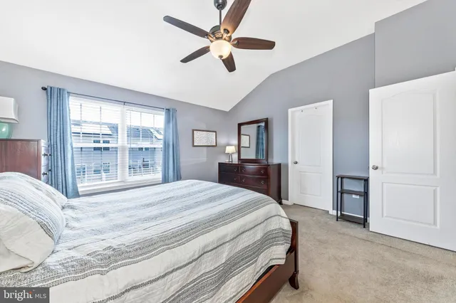 a room with furniture and a large window