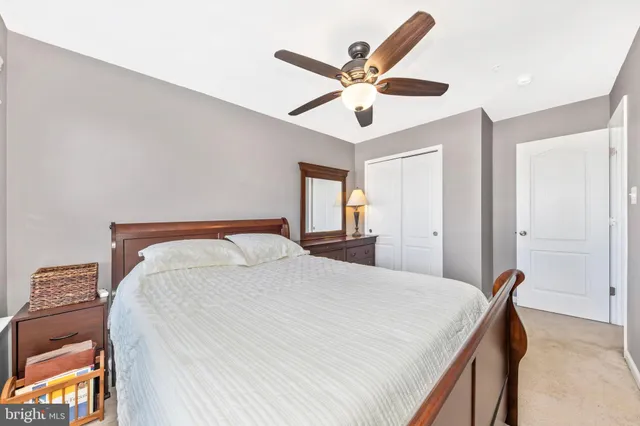 a view of a roof deck with table and chairs and wooden floor