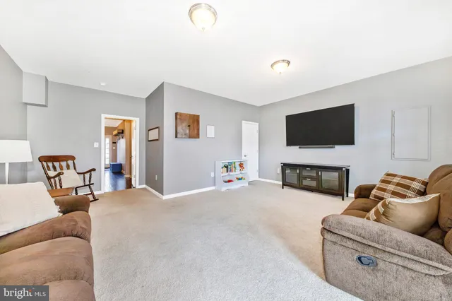 a bathroom with a toilet and a sink