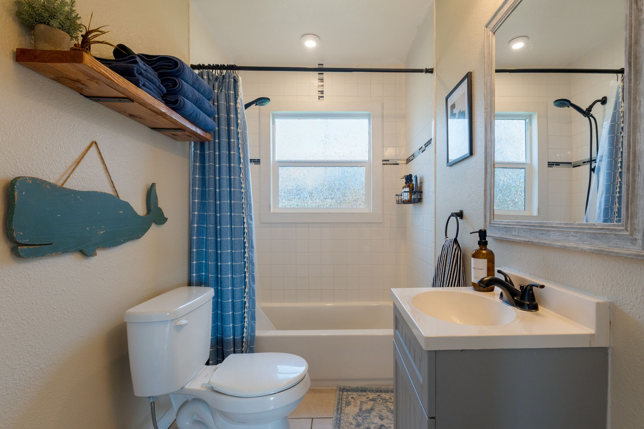 6129 Farm To Market 2313 Kempner, TX 76539 - Photo 11 of 28 a bathroom with a toilet sink vanity tub and shower