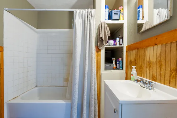 a bathroom with a sink and a bathtub