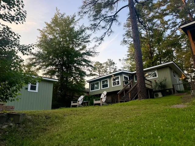 a view of house with outdoor space and entertaining space