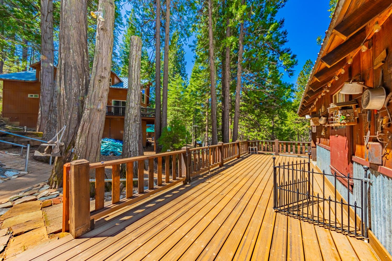 50054 Poplar Road Oakhurst, CA 93644 - Photo 20 of 34 a view of balcony with wooden floor and fence