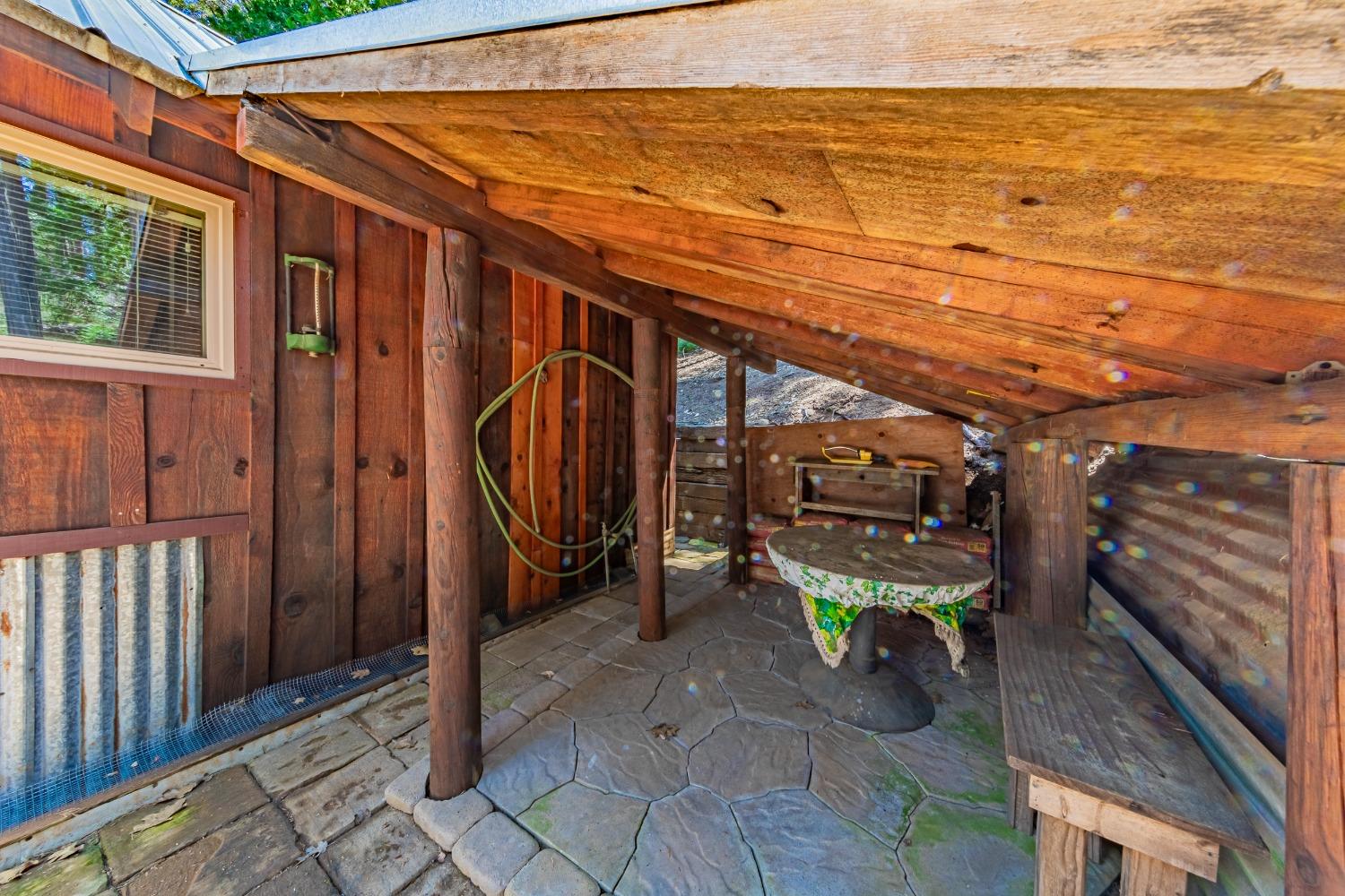 50054 Poplar Road Oakhurst, CA 93644 - Photo 22 of 34 a view of a room with wooden floor and windows