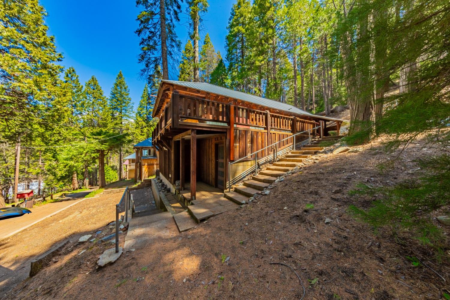 50054 Poplar Road Oakhurst, CA 93644 - Photo 28 of 34 a view of backyard with deck and garden