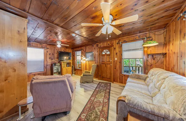 a view of a livingroom with furniture window and outside view