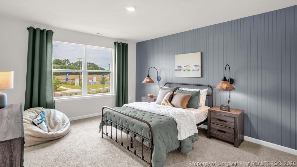 386 Hartfield Avenue Raeford, NC 28376 - Photo 22 of 32 a bedroom with a bed and a window