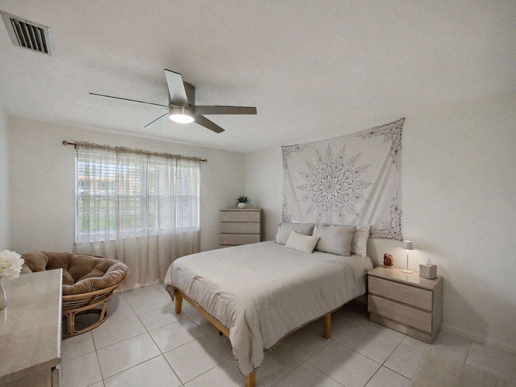 1967 Southwest Palm City Road, Unit 34C Stuart, FL 34994 - Photo 11 of 25 a bedroom with a bed and window