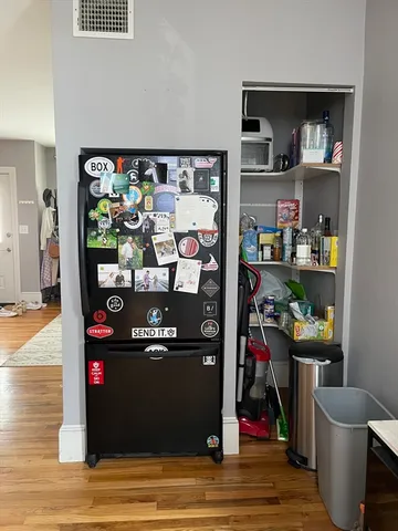 a view of a dining room with shelves