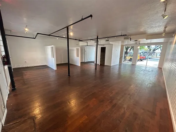 a workspace with furniture and a window