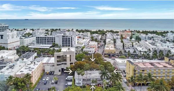 an aerial view of a house with outdoor space