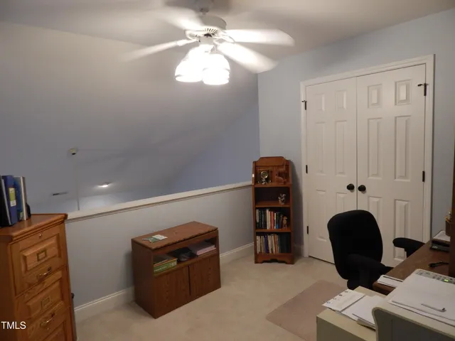 a view of workspace with lounge chair