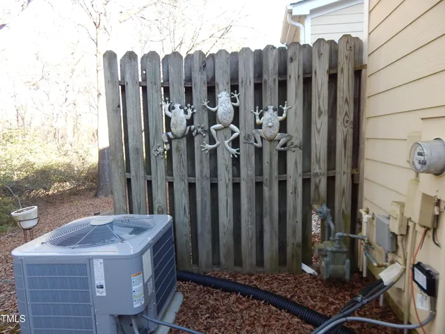 a view of a backyard with chairs