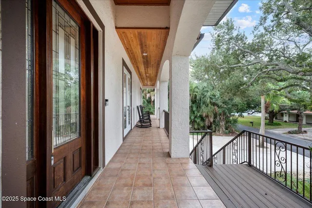 a picture of a bathroom with a shower