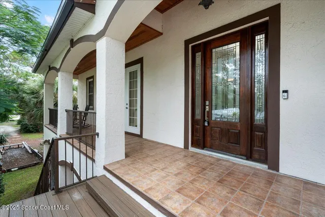 a view of a hallway view with staircase