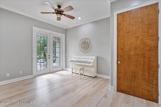 a view of a room with wooden floor and workspace