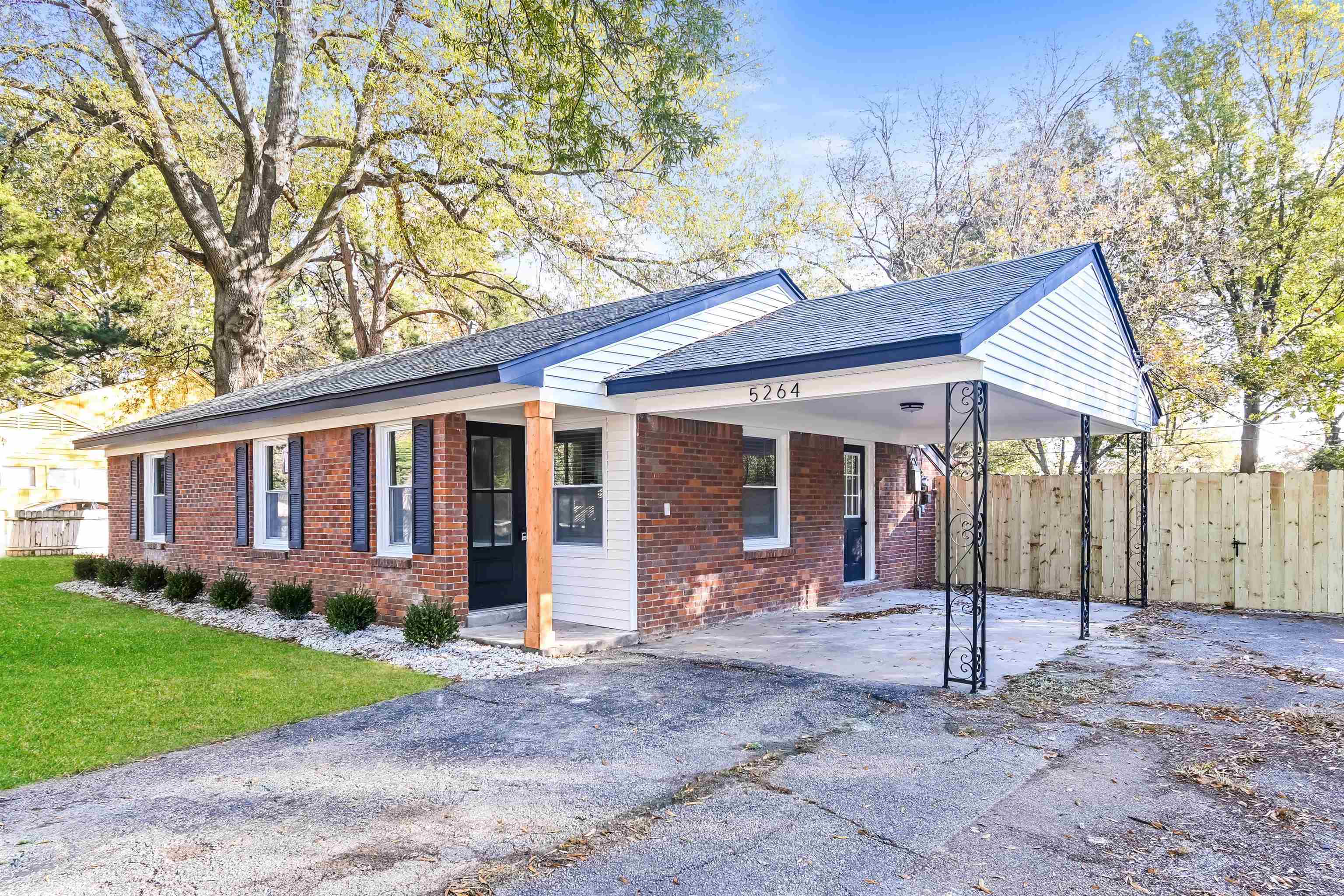 5264 Lochinvar Road Memphis, TN 38116 - Photo 2 of 13 a front view of a house with garden