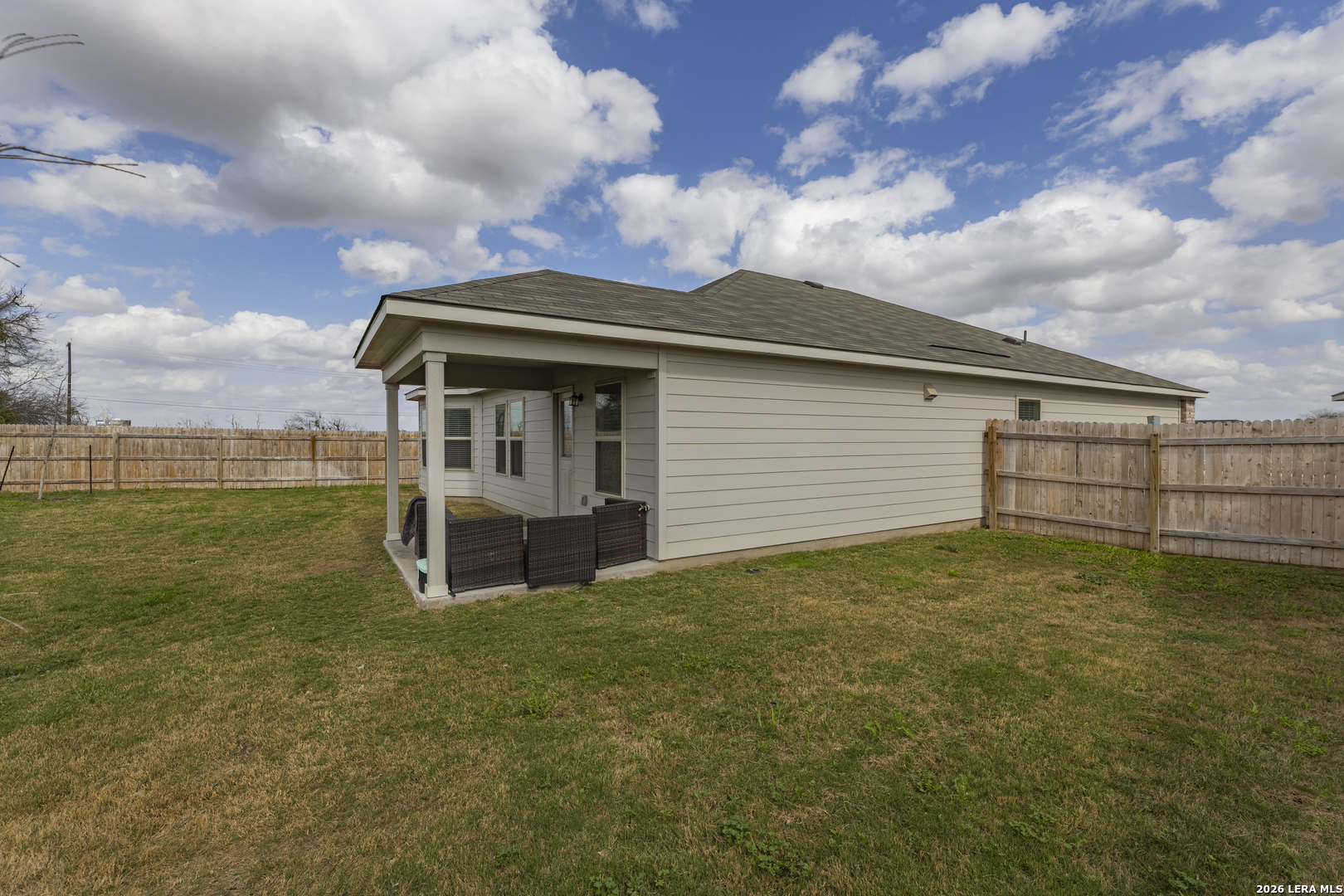 3035 Selhurst Street Converse, TX 78109 - Photo 17 of 18 a view of a house with a backyard