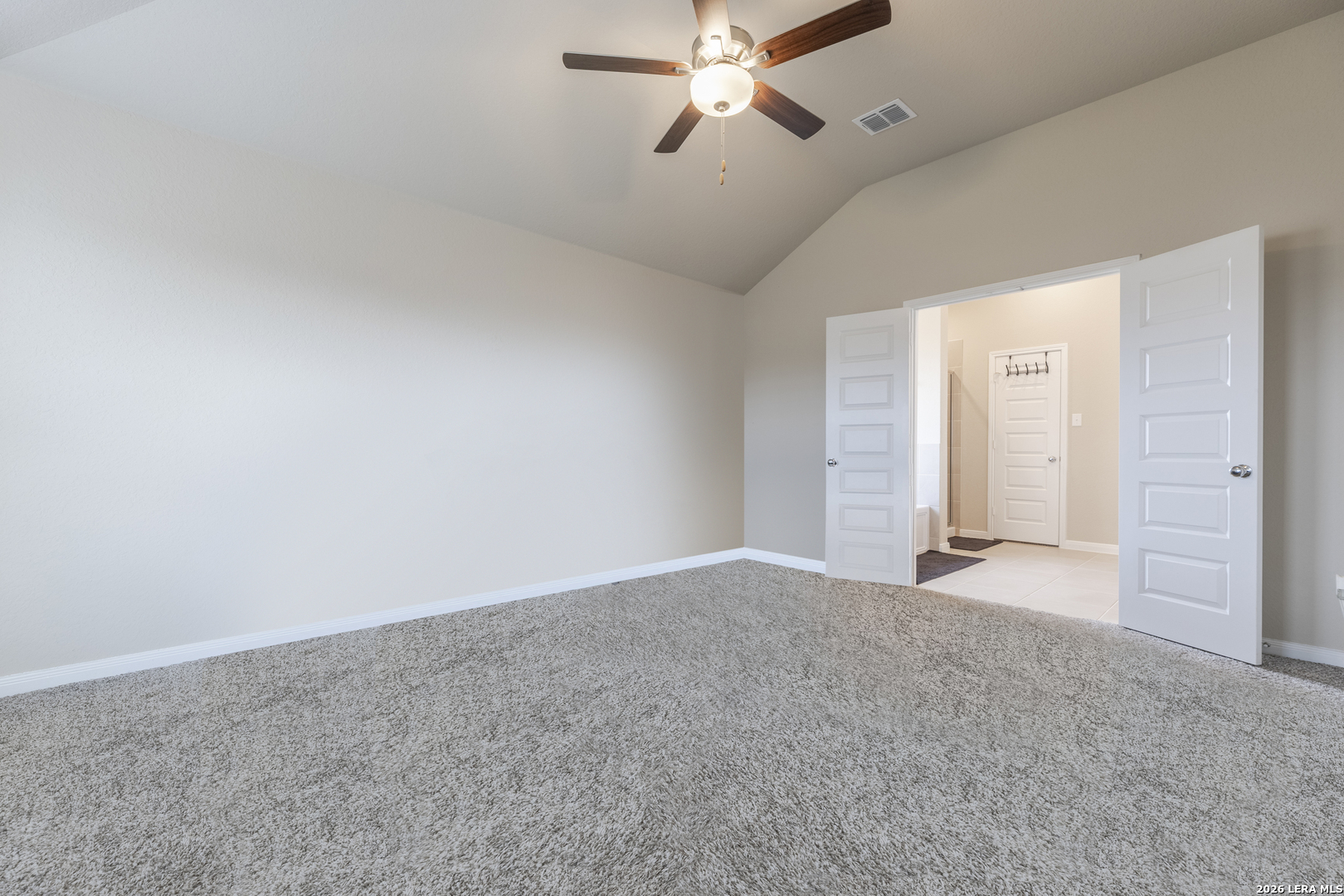 3035 Selhurst Street Converse, TX 78109 - Photo 9 of 18 an empty room with chandelier fan