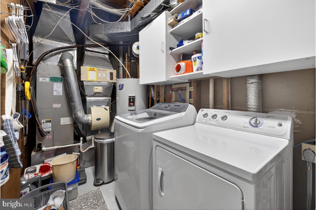 7347 Swan Point Way, Unit 122 Columbia, MD 21045 - Photo 36 of 54 a utility room with dryer and washer