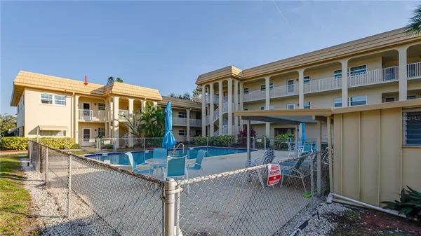 a view of building with outdoor seating