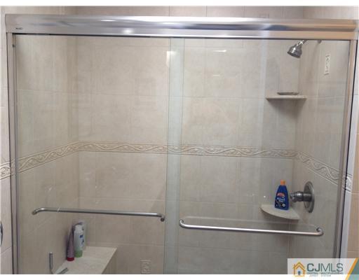 4402 Stonehedge Road Edison, NJ 08820 - Photo 20 of 25 a close view of shower
