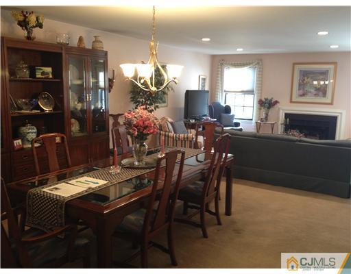 4402 Stonehedge Road Edison, NJ 08820 - Photo 5 of 25 a view of a dining room with furniture