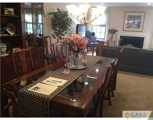4402 Stonehedge Road Edison, NJ 08820 - Photo 6 of 25 a view of a dining room with furniture