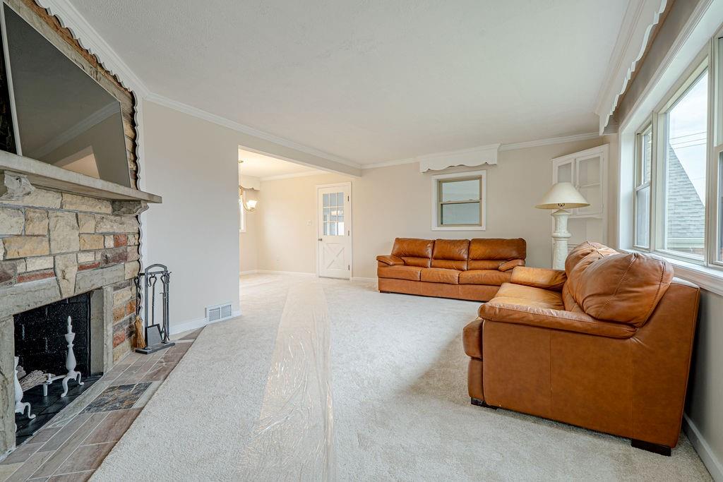 1435 Morrow Road Pittsburgh, PA 15241 - Photo 7 of 26 a bedroom with furniture and a fireplace