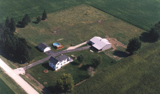 2519 South Chamberlain Road Esmond, IL 60129 - Photo 1 of 6 an aerial view of a house with a yard