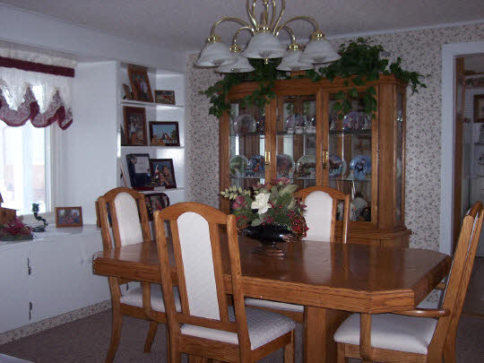 2519 South Chamberlain Road Esmond, IL 60129 - Photo 6 of 6 a dining room with furniture and chandelier
