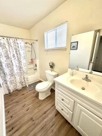 a bathroom with a sink and a large mirror