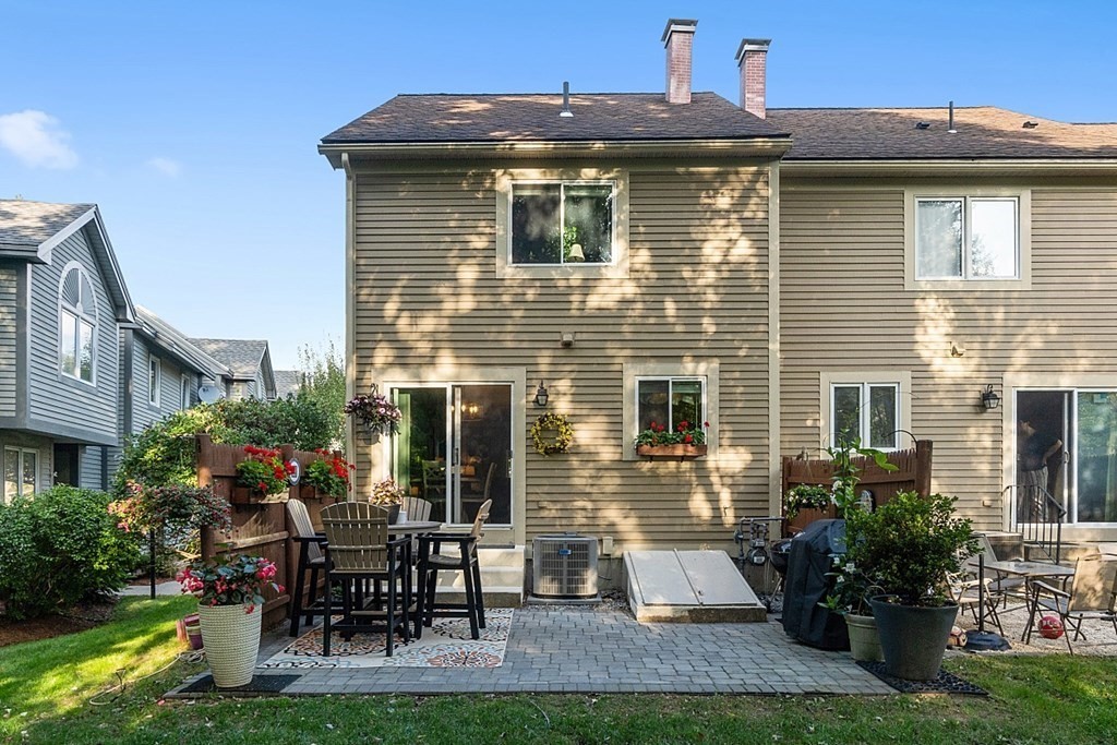 55 Littleton Road, Unit 2F Ayer, MA 01432 - Photo 26 of 29 a view of a yard with seating space