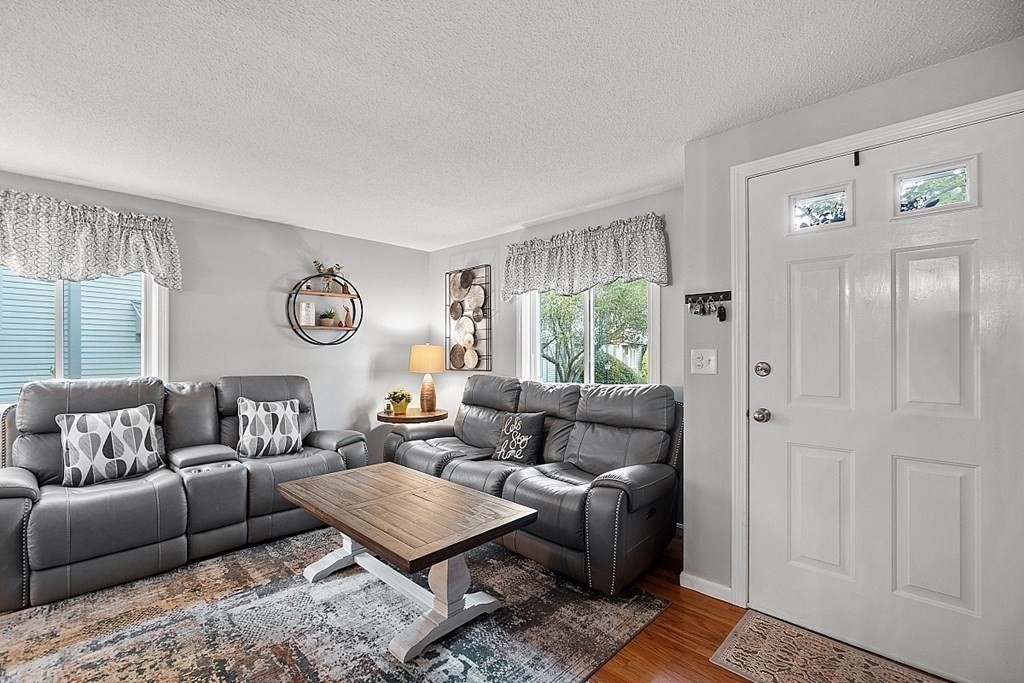 55 Littleton Road, Unit 2F Ayer, MA 01432 - Photo 4 of 29 a living room with furniture and a window