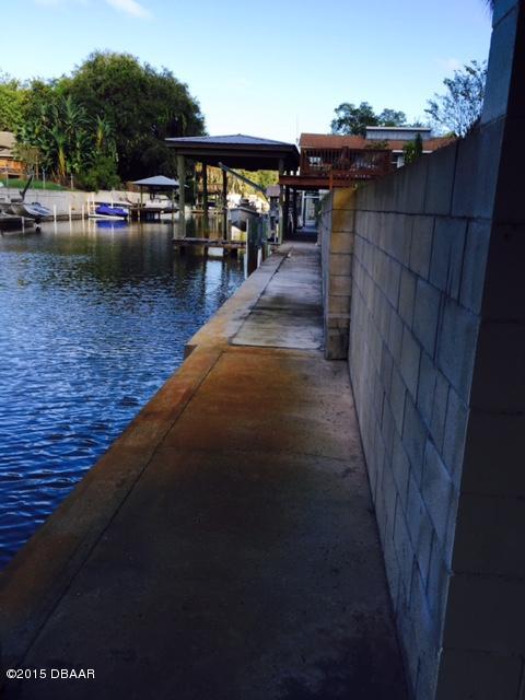 137 Flamingo Road Edgewater, FL 32141 - Photo 27 of 37 Solid Seawall