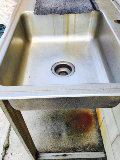 137 Flamingo Road Edgewater, FL 32141 - Photo 33 of 37 Fish Cleaning Station