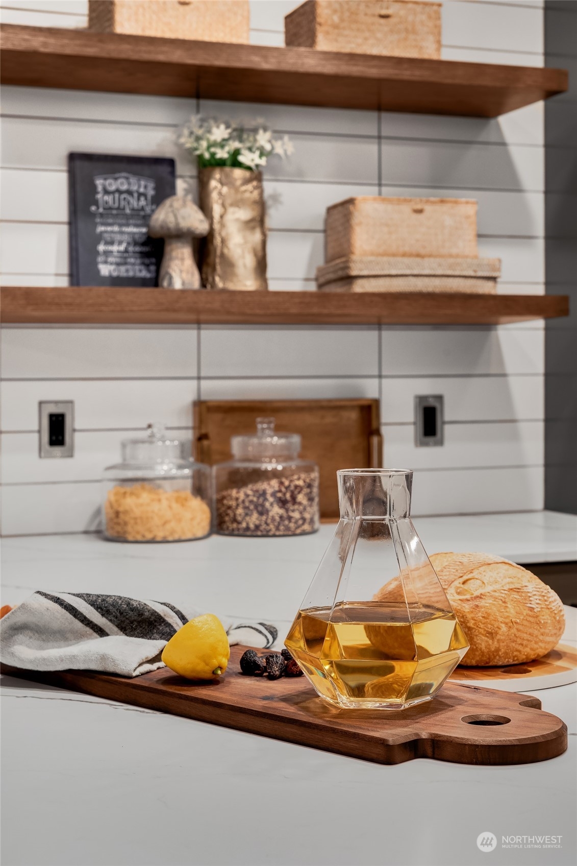 8457 Midland Road Medina, WA 98039 - Photo 17 of 40 a kitchen with a stove and cabinets