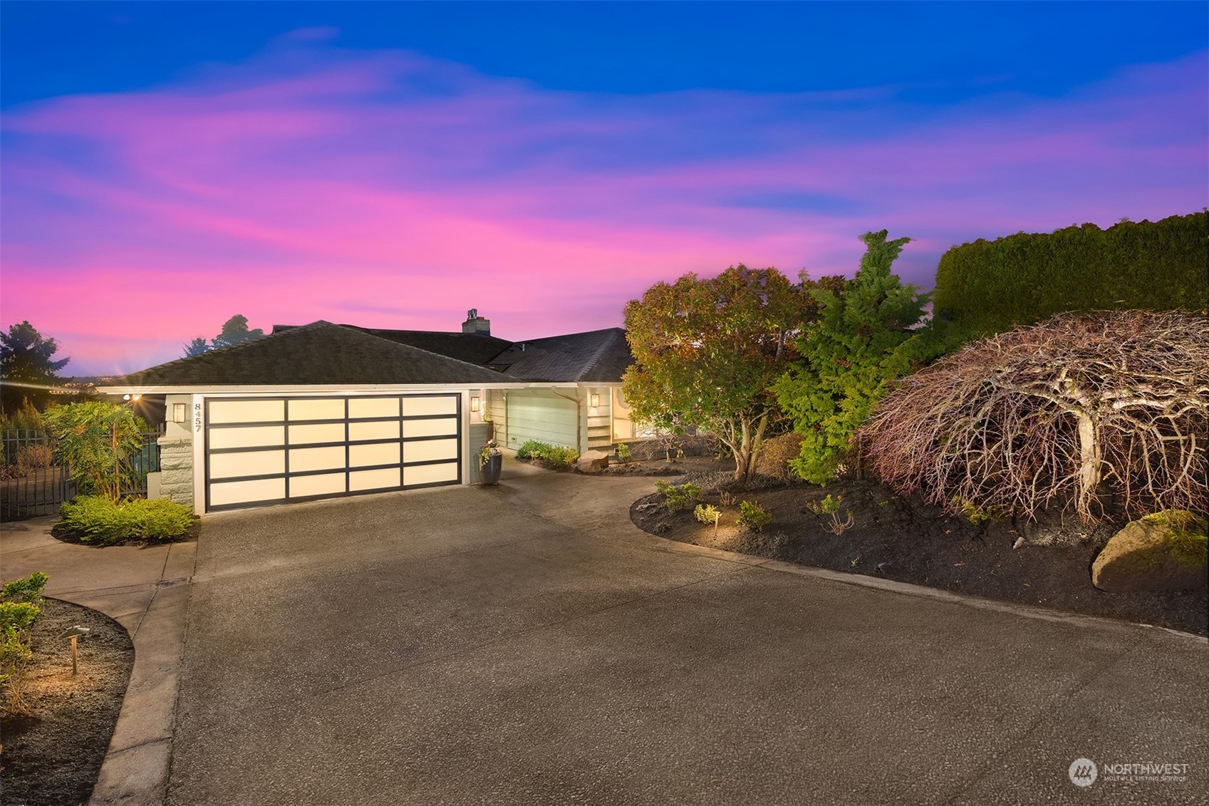 8457 Midland Road Medina, WA 98039 - Photo 2 of 40 a view of a street with a building in the background