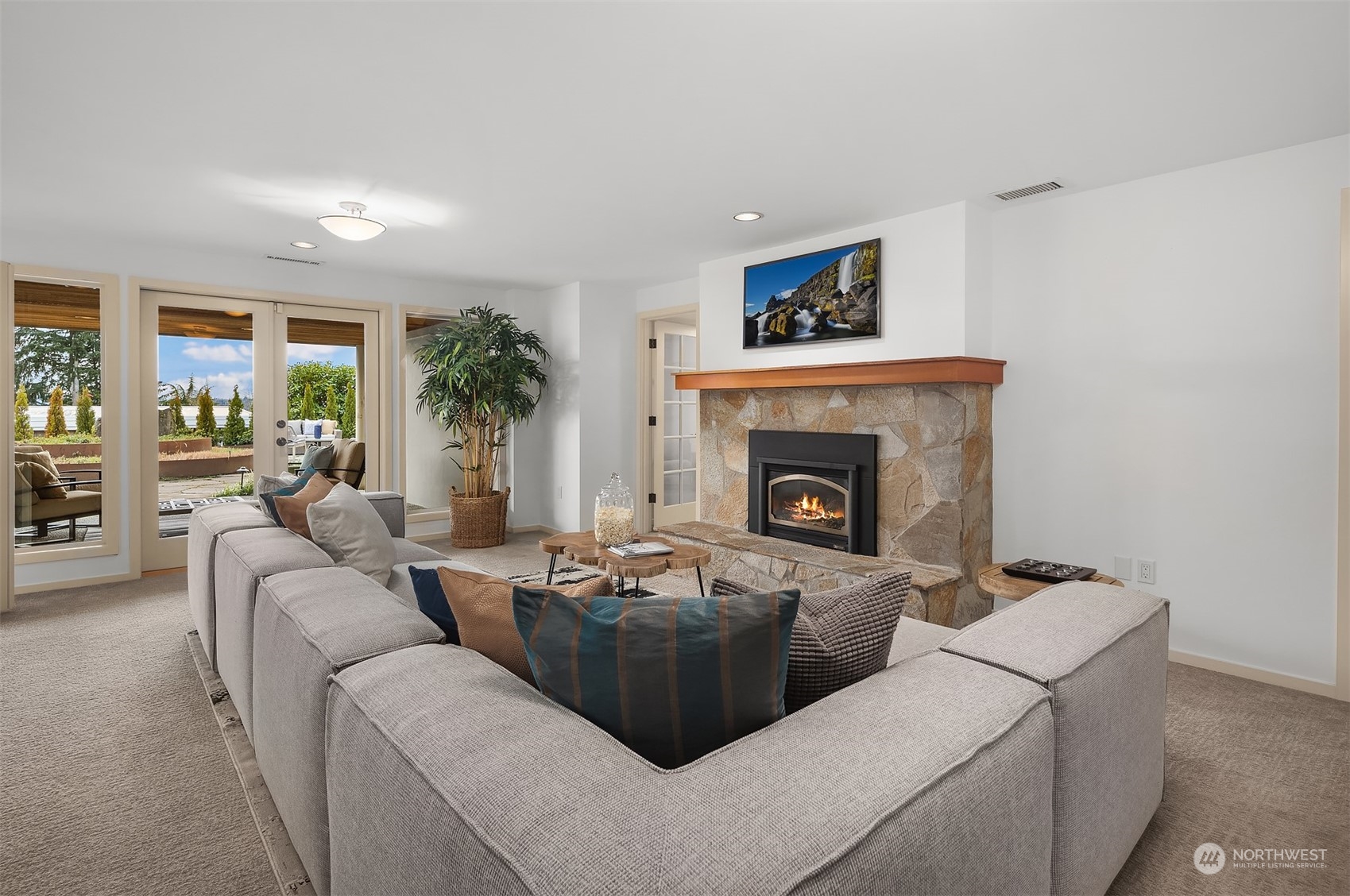 8457 Midland Road Medina, WA 98039 - Photo 29 of 40 a living room with furniture and a fireplace