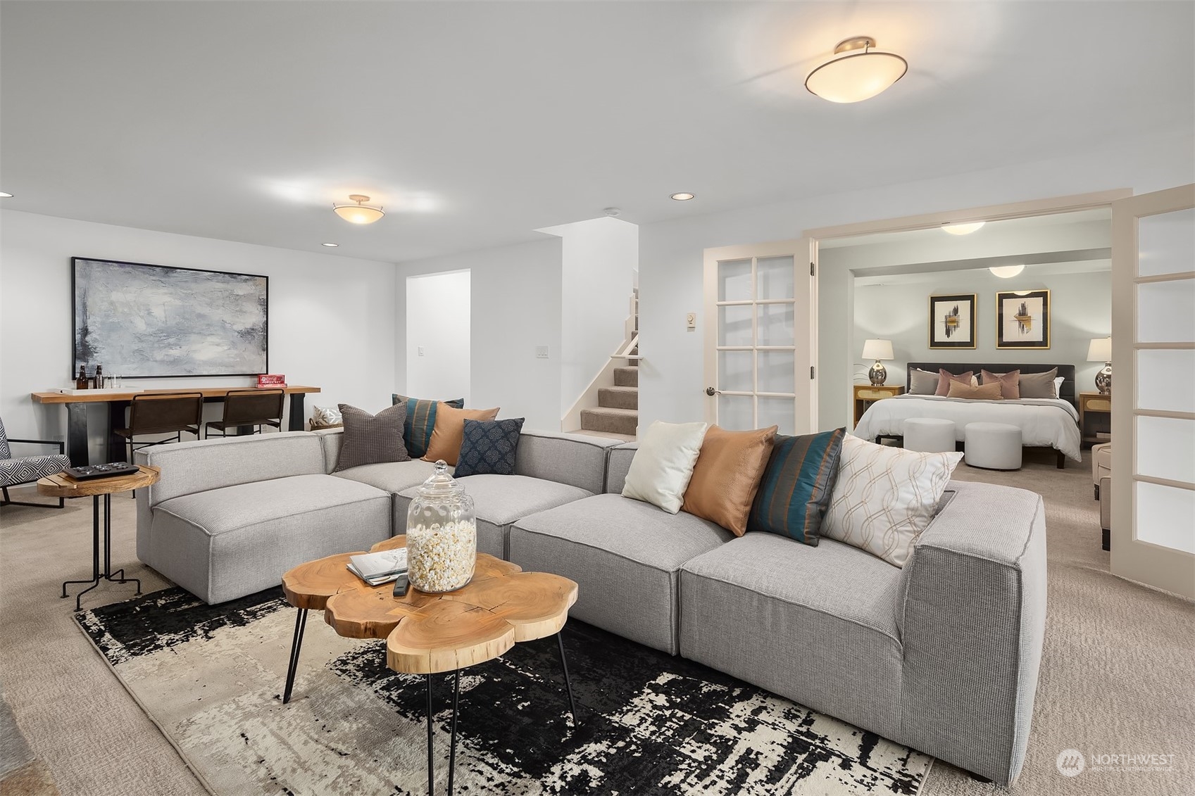 8457 Midland Road Medina, WA 98039 - Photo 30 of 40 a living room with furniture and a wooden floor