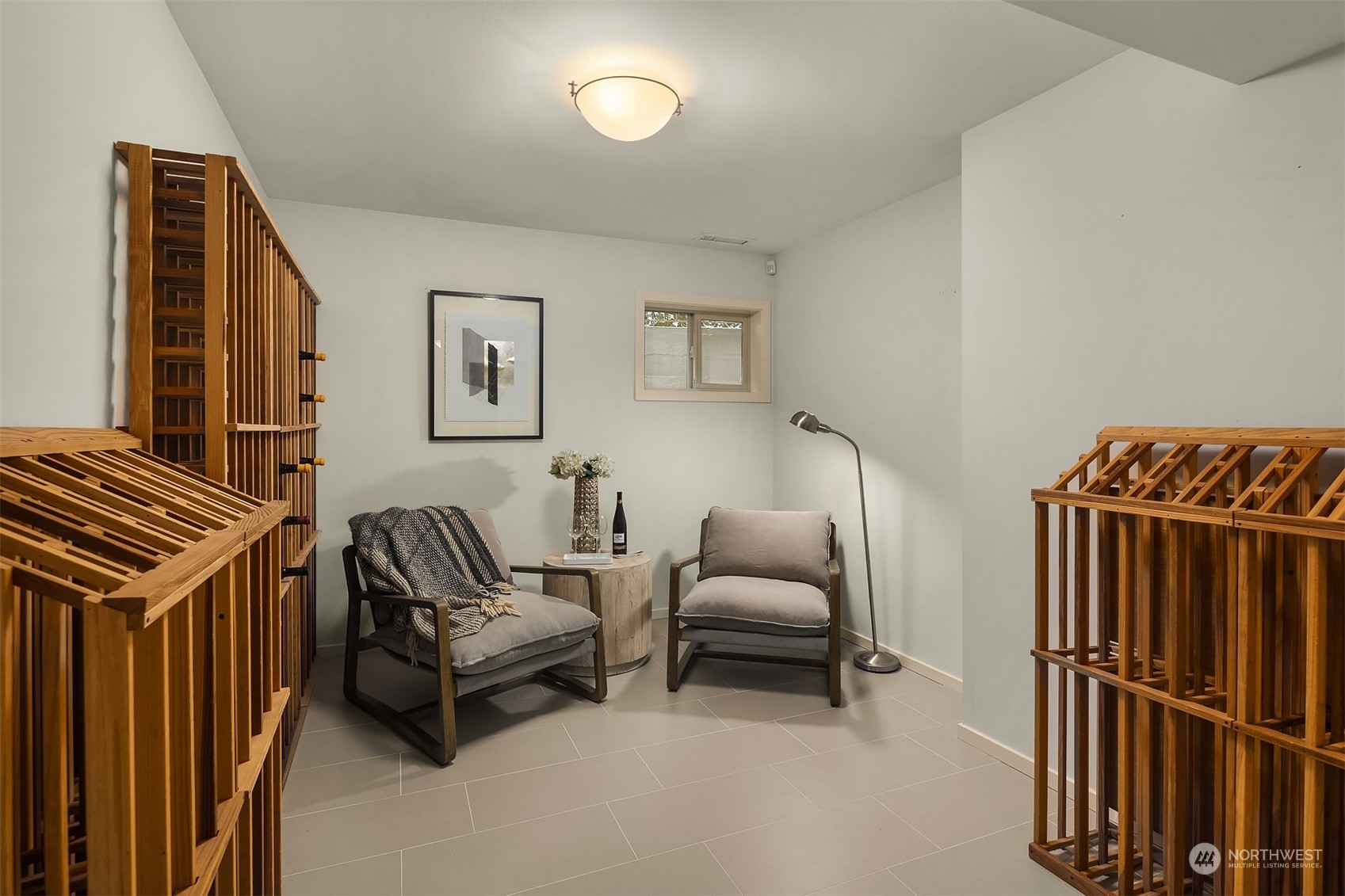 8457 Midland Road Medina, WA 98039 - Photo 32 of 40 a bedroom with furniture and a window