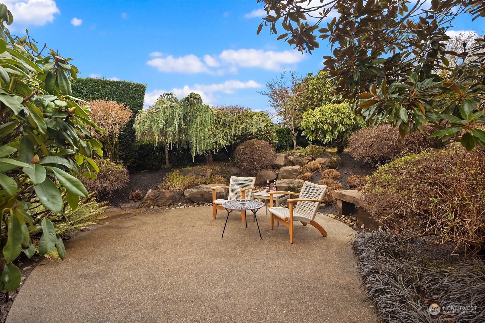 8457 Midland Road Medina, WA 98039 - Photo 35 of 40 a view of a chairs and table in the patio