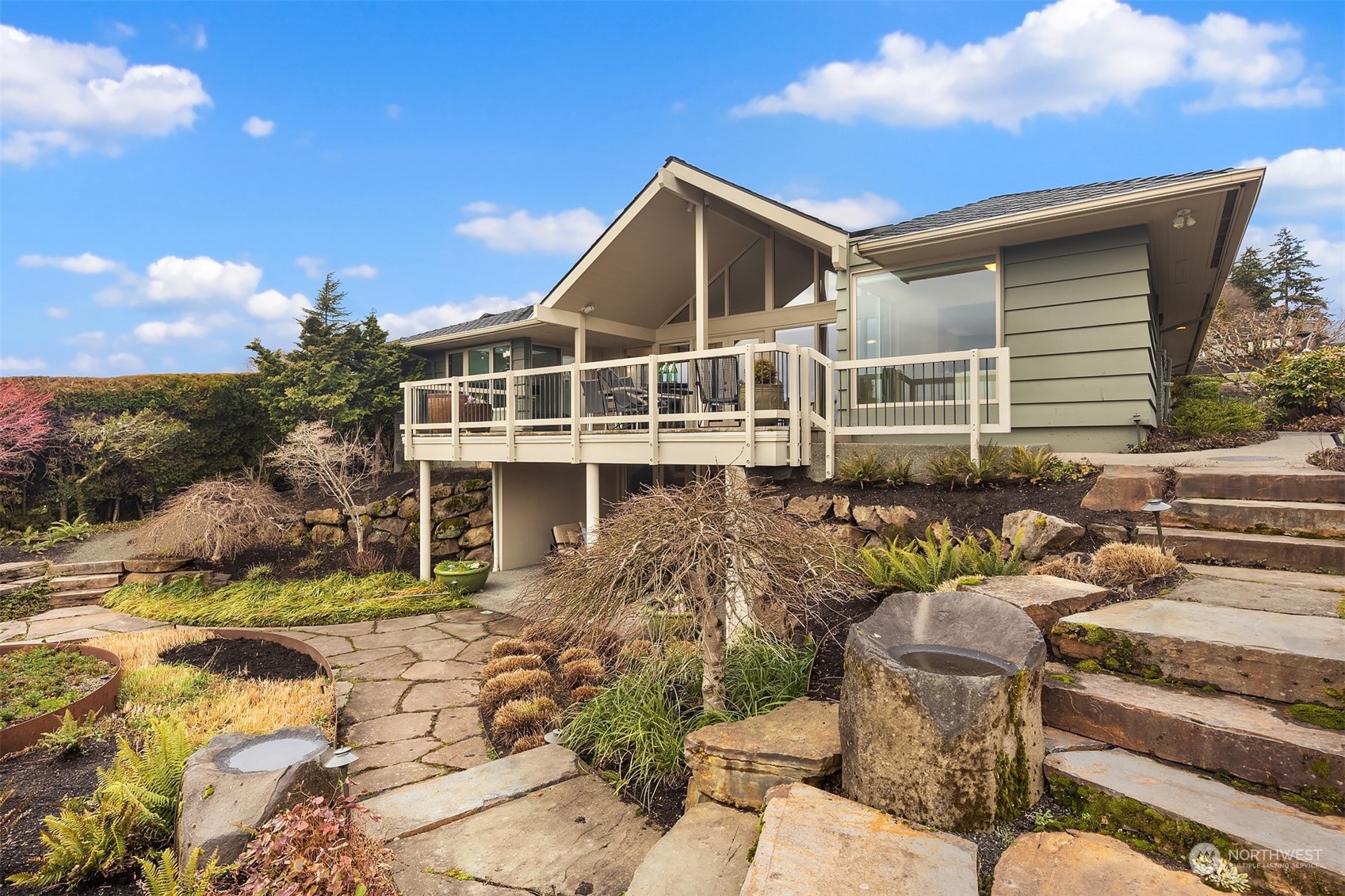 8457 Midland Road Medina, WA 98039 - Photo 36 of 40 a front view of a house with garden