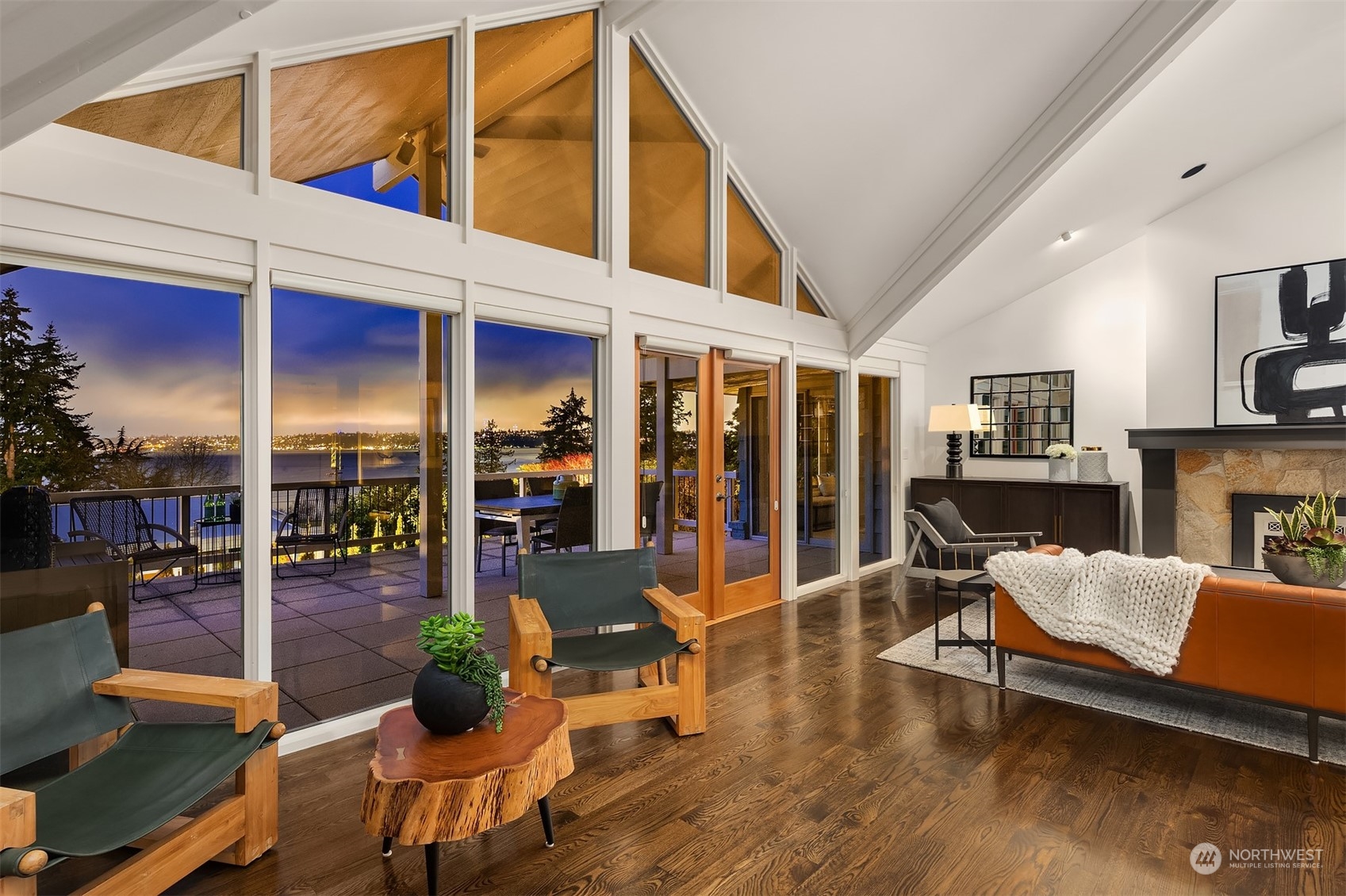 8457 Midland Road Medina, WA 98039 - Photo 5 of 40 a living room with furniture a wooden floor and next to a window